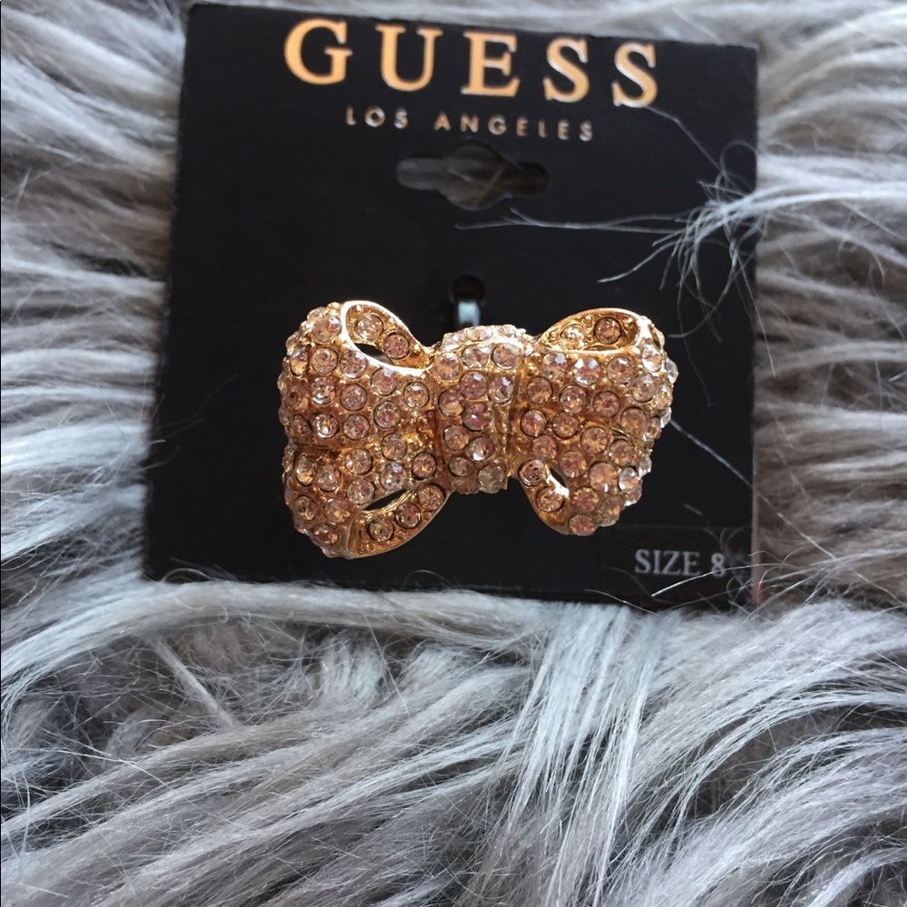 New with tag BEAUTIFUL GUESS gold bow RING w/gems